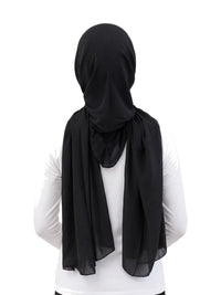 Black Imaarah Ninja Chiffon Shawl, back view, scarf draped over the shoulders