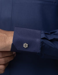 Amaani Stark Kids Designer Thobe, Navy, cuff patterning and signature button on model