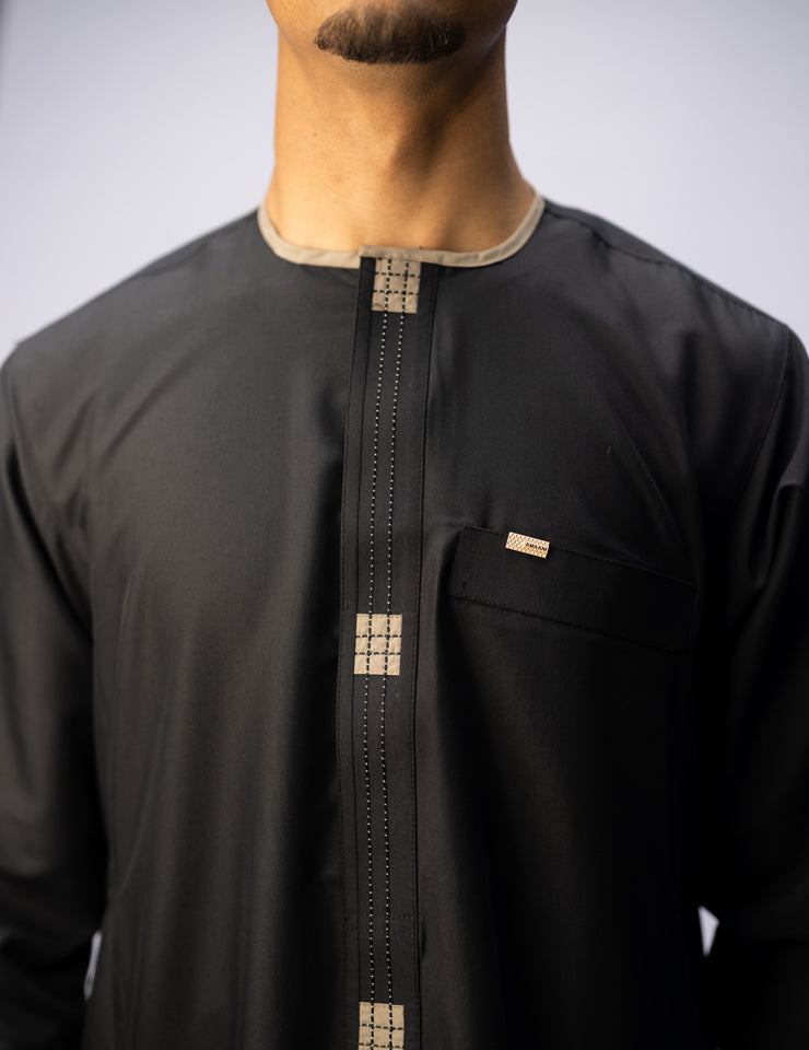 Amaani Dune Collarless Thobe, Black, collarless neckline and intricate placket on model