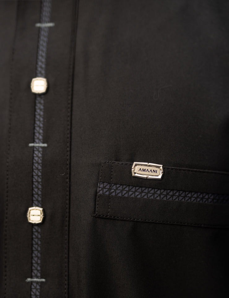 Amaani Eclipse Short Sleeve Thobe, Black, placket buttons and pocket trim close up
