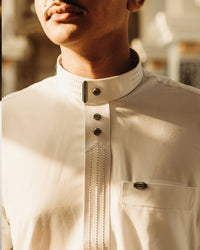 Amaani Hubb Nikah Thobe, White, placket buttons, warm editorial light