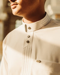 Amaani Hubb Nikah Thobe, White, shoulder detail, warm editorial light