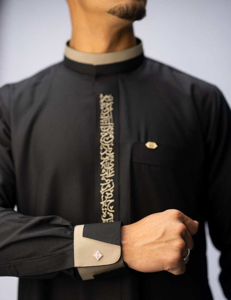 Amaani Noir Calligraphy Thobe, Black, placket embroidery and cuff detail on model