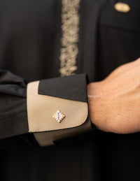 Amaani Noir Calligraphy Thobe, Black, architectural cuff and beige contrast close up
