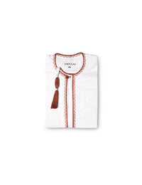Amaani Omani Thobe Kids, Desert Coral (White), folded flat lay showing coral placket embroidery and collar tassel