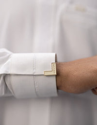 Amaani Sultan Saudi Thobe, Alabaster, cuff and signature button on model