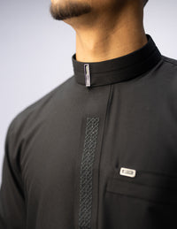 Amaani Sultan Saudi Thobe, Black, tonal placket embroidery on model