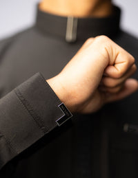 Amaani Sultan Saudi Thobe, Black, cuff and signature button close up