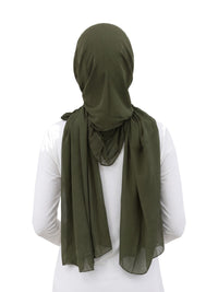 Green Imaarah Ninja Chiffon Shawl, back view, scarf draped over the shoulders