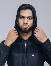 Amaani Drift Kids Hooded Thobe, Black, model with the hood up, front view
